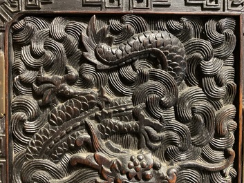 Un petit cabinet en bois sculpt&eacute; &agrave; d&eacute;cor de dragons, Chine, R&eacute;publique